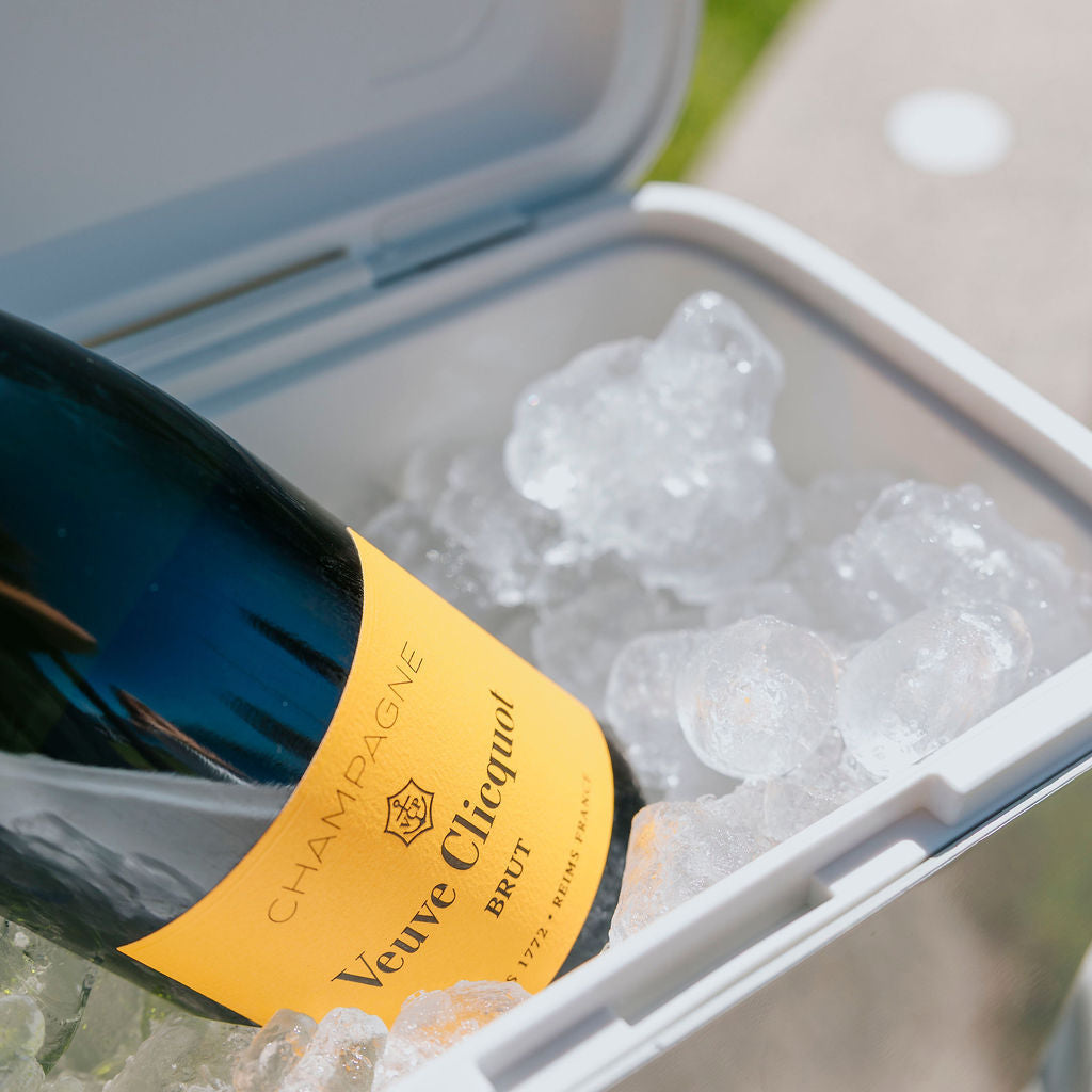 Parcelle | Parcelle Ivory Kewlr cooler holding champagne, ideal for summer gifting, settlement gifts, and bespoke hampers