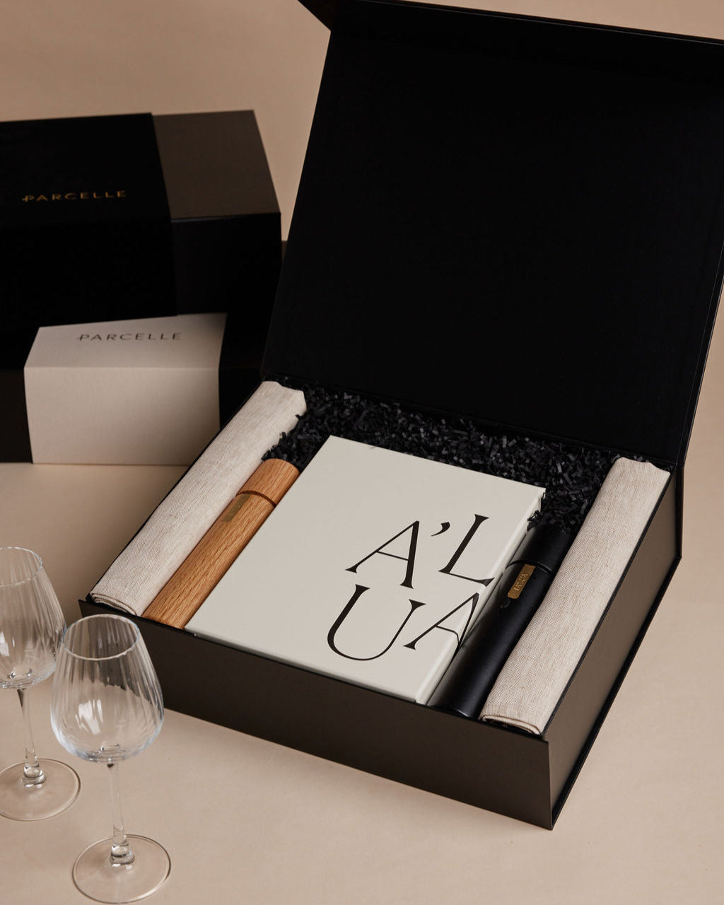 Parcelle | The Duplex XL settlement gift box with wine glass set, linen tea towels, and wooden salt & pepper grinder — premium housewarming hamper Sydney
