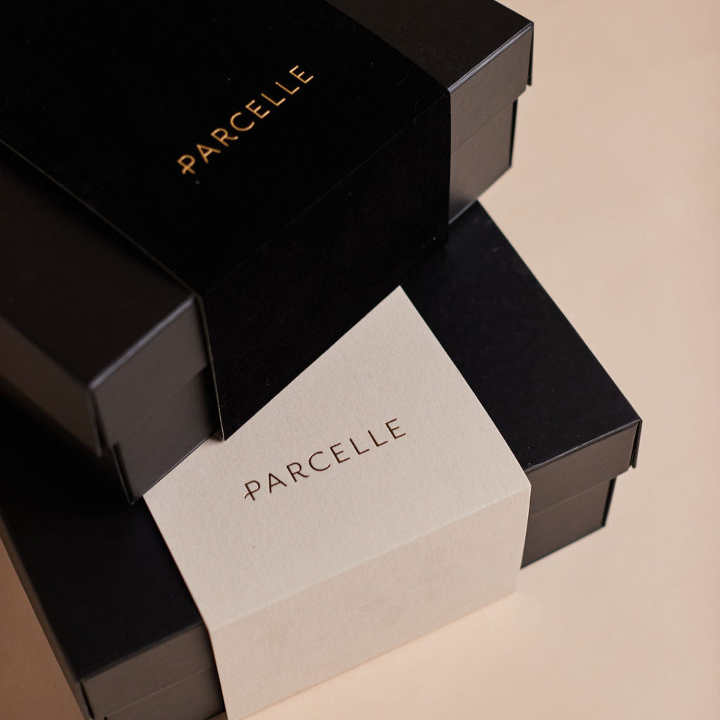 Parcelle | A’Lua Grandeur settlement gift hamper with champagne flutes, luxury homewares, artisan crackers, and linen tea towel in Parcelle XL gift box — perfect real estate or housewarming gift Sydney