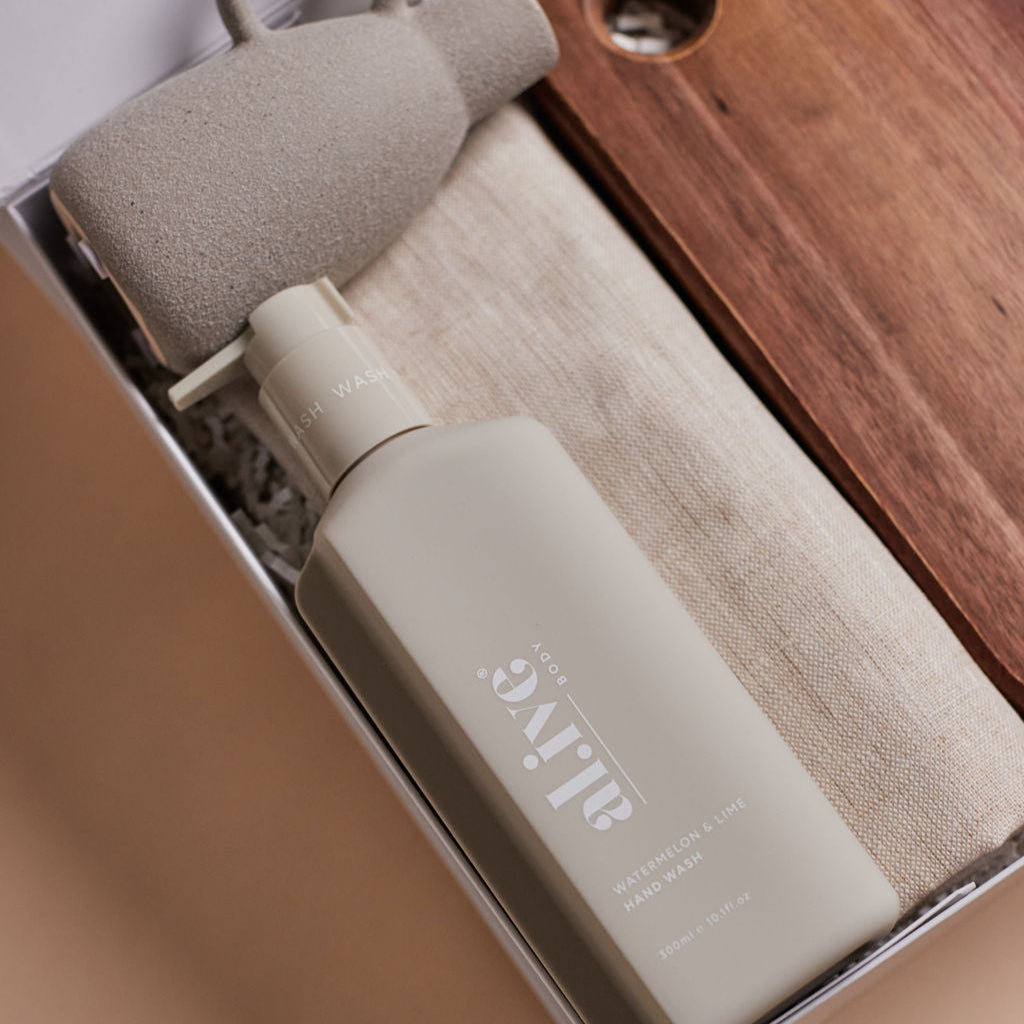 Parcelle | The Villa luxury housewarming gift with hand wash, linen towel, cheese knife set, wooden board, and ceramic vase in Parcelle gift box — perfect settlement gift Sydney
