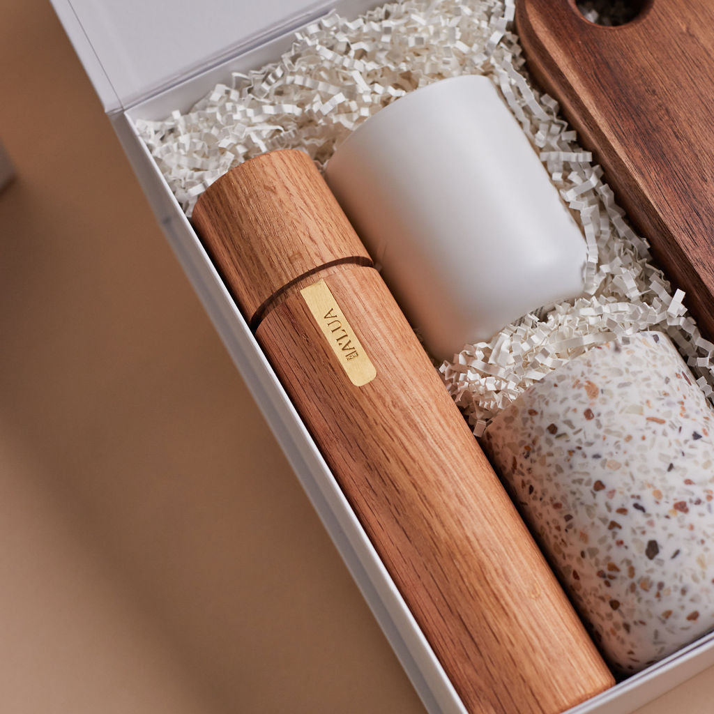 Parcelle | The Suite real estate settlement gift box with linen tea towel, salt & pepper grinder, fig & cassis candle, terrazzo tumbler, and wooden board