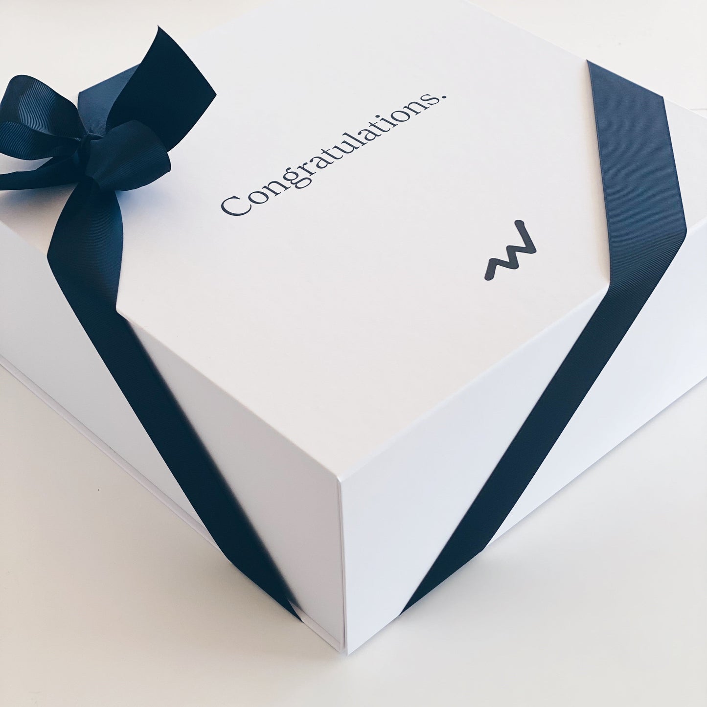Parcelle | Business gifting handover with Parcelle luxury gift box, creating memorable client and settlement gift experiences in Sydney.