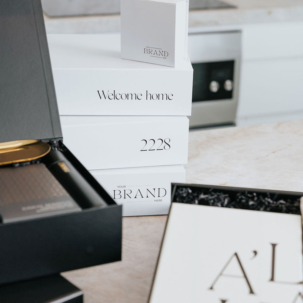 Branded Real Estate Settlement Gifts with Welcome Home, personalised with postcode and Printed Key Boxes for Real Estate, property & Construction Industies