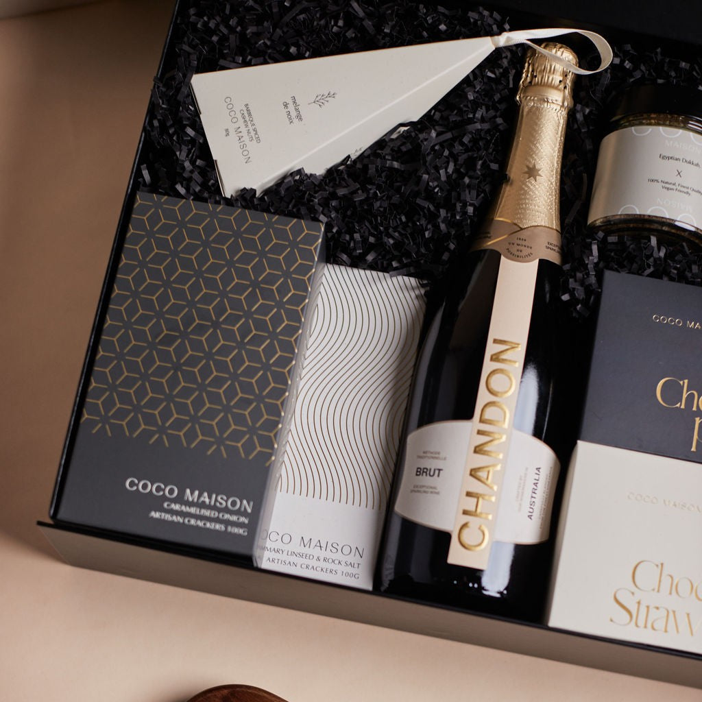 Parcelle | Luxury corporate and personal hamper by Parcelle featuring champagne, artisan treats, and branded packaging, Sydney delivery.