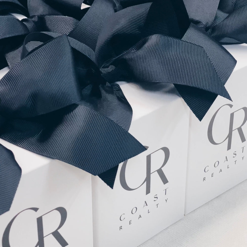 Parcelle | Branded Scented candles and Candle Gift Boxes presented with logo matching ribbon | Coast Realty