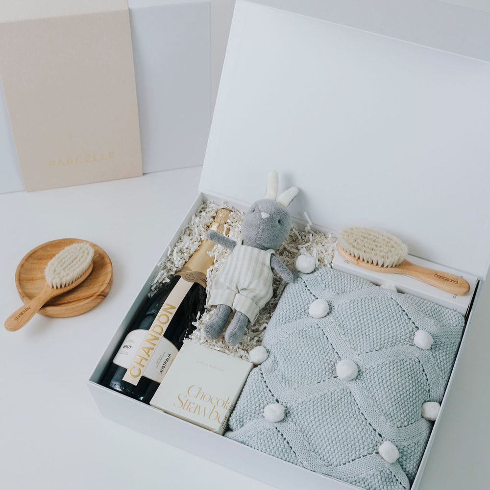 
                      
                        The Luxe Baby Boy Hamper
                      
                    