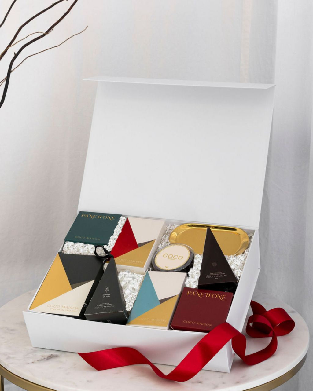 Parcelle | “A Joyous Noel luxury Christmas hamper with Panettone, Pistachio Knafeh chocolate, gold tray & festive treats, presented in Parcelle gift box for corporate Christmas gifting
