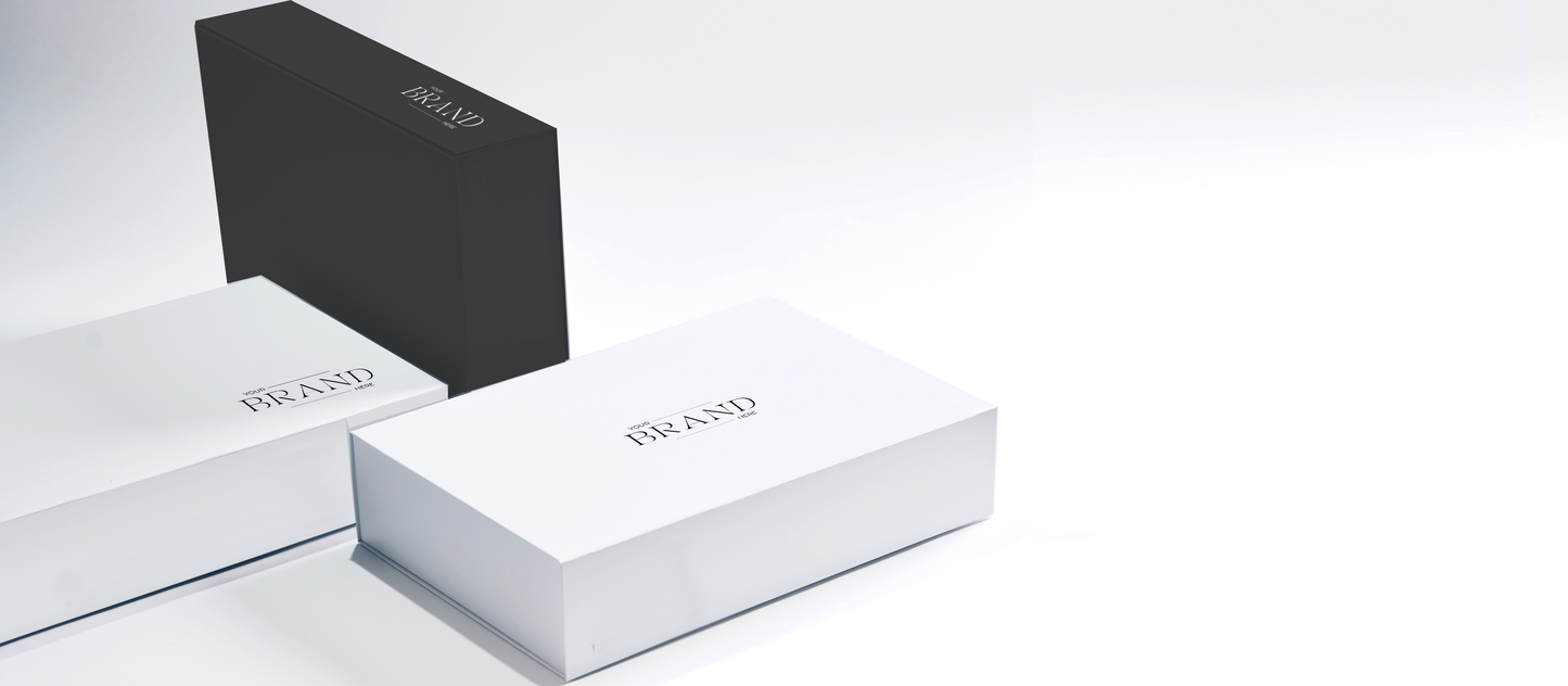 Parcelle Business Gifting for all industries and occasions - a collage of elegant white and black gift boxes with 'Your Brand Here' displayed, highlighting the versatility and custom branding options available to add your company logo and brand to any luxury gift box for a personalized corporate gifting experience.