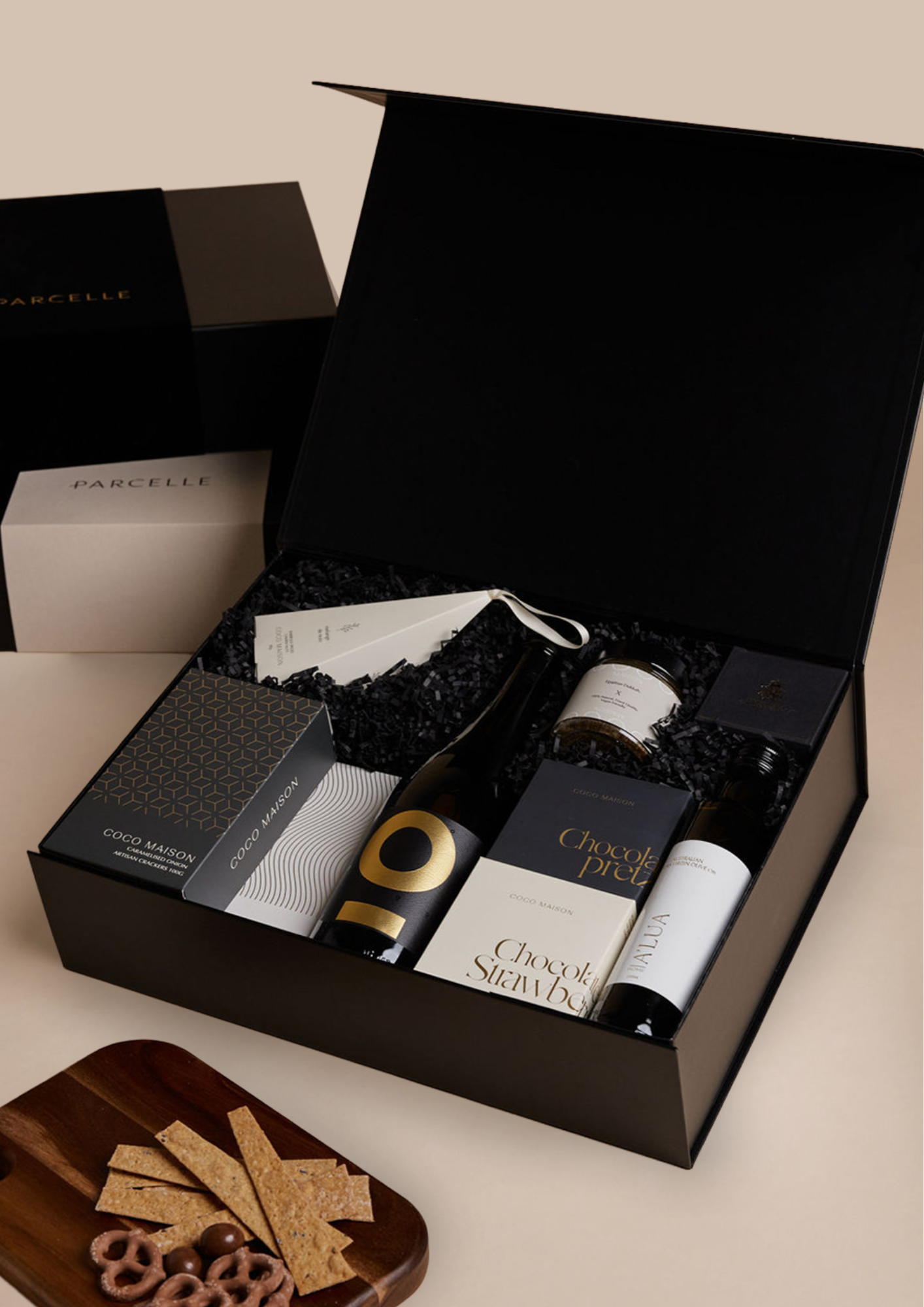 Parcelle | Corporate Prosecco Christmas Hamper with Posh Plonk Prosecco, olive oil, savoury crackers, tapenade, chocolates and cashews in Parcelle XL Gift Box with custom logo branding and ribbon