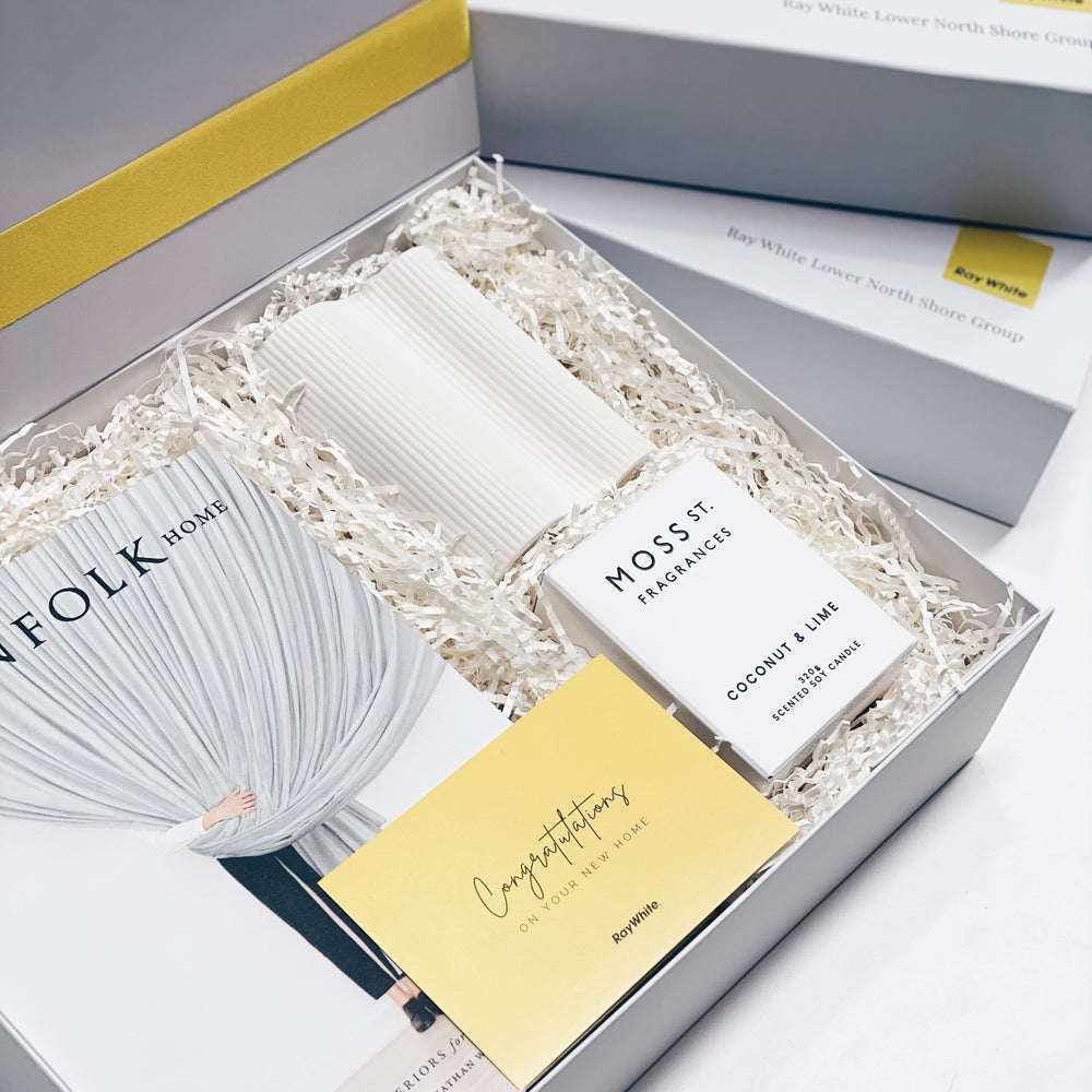 Parcelle - Ray White branded Settlement GIfts presented open with branded logo and personalised gift boxes 