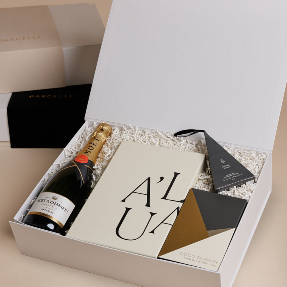 Parcelle | Corporate Moët Christmas Hamper with champagne, fluted glasses, chocolates and macadamias in Parcelle XL Gift Box with custom logo branding and ribbon