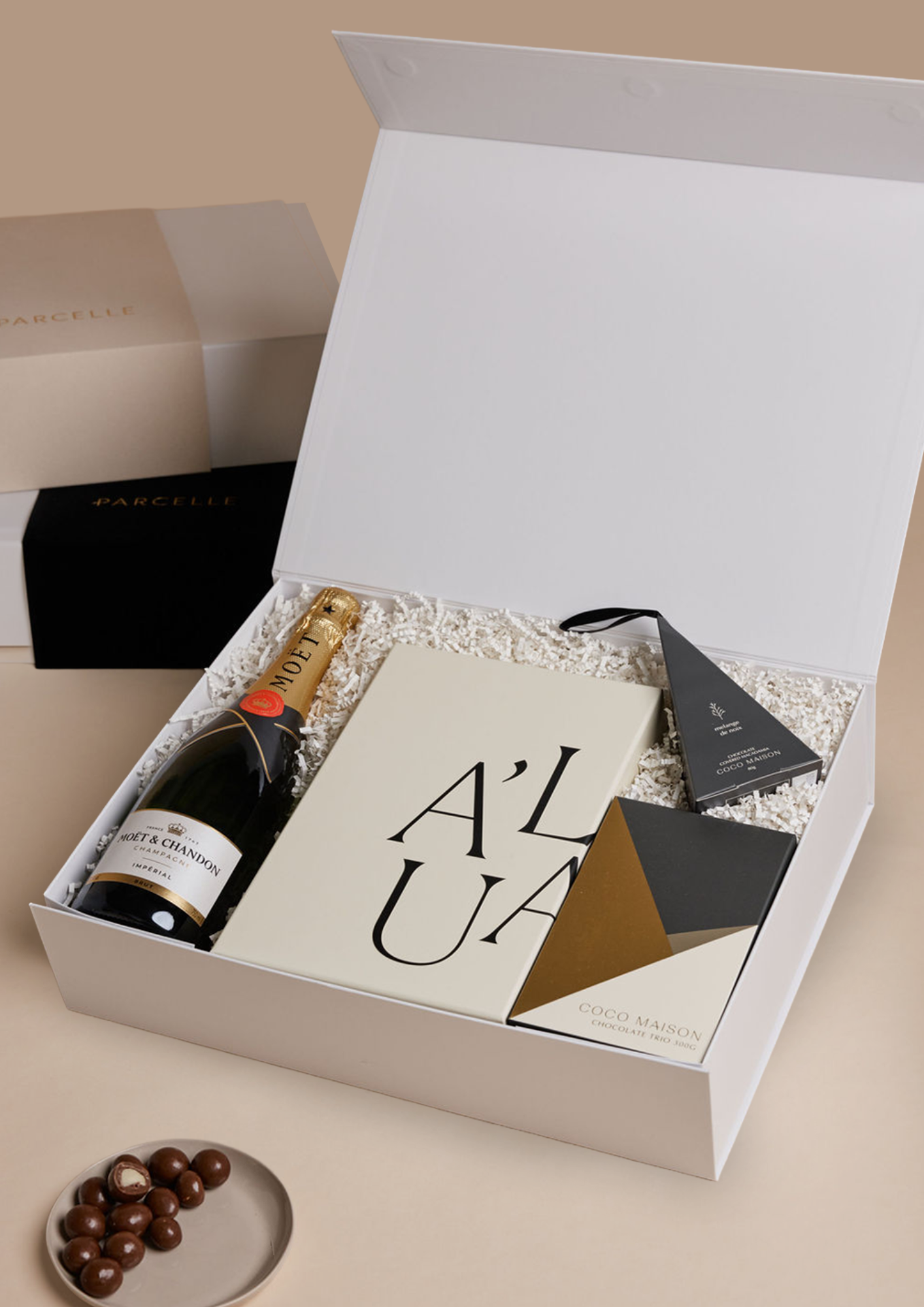 Parcelle | Corporate Moët Christmas Hamper with champagne, fluted glasses, chocolates and macadamias in Parcelle XL Gift Box with custom logo branding and ribbon