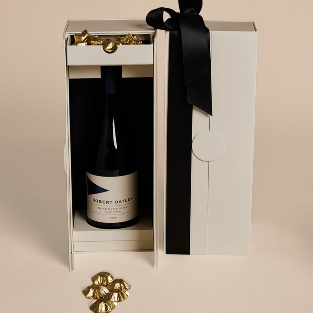Parcelle | Parcelle Oatley Red Christmas Cellar featuring Robert Oatley Signature Series Shiraz and Belgian gold star chocolates in a luxury double-door cellar gift box.