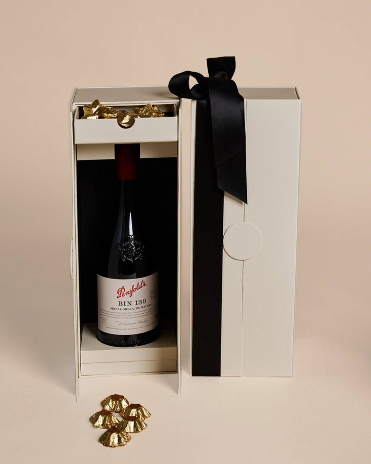 Parcelle | Parcelle Penfolds Christmas Cellar gift box featuring Penfolds Bin 138 Shiraz and Belgian gold star chocolates in a signature double-door cellar box.