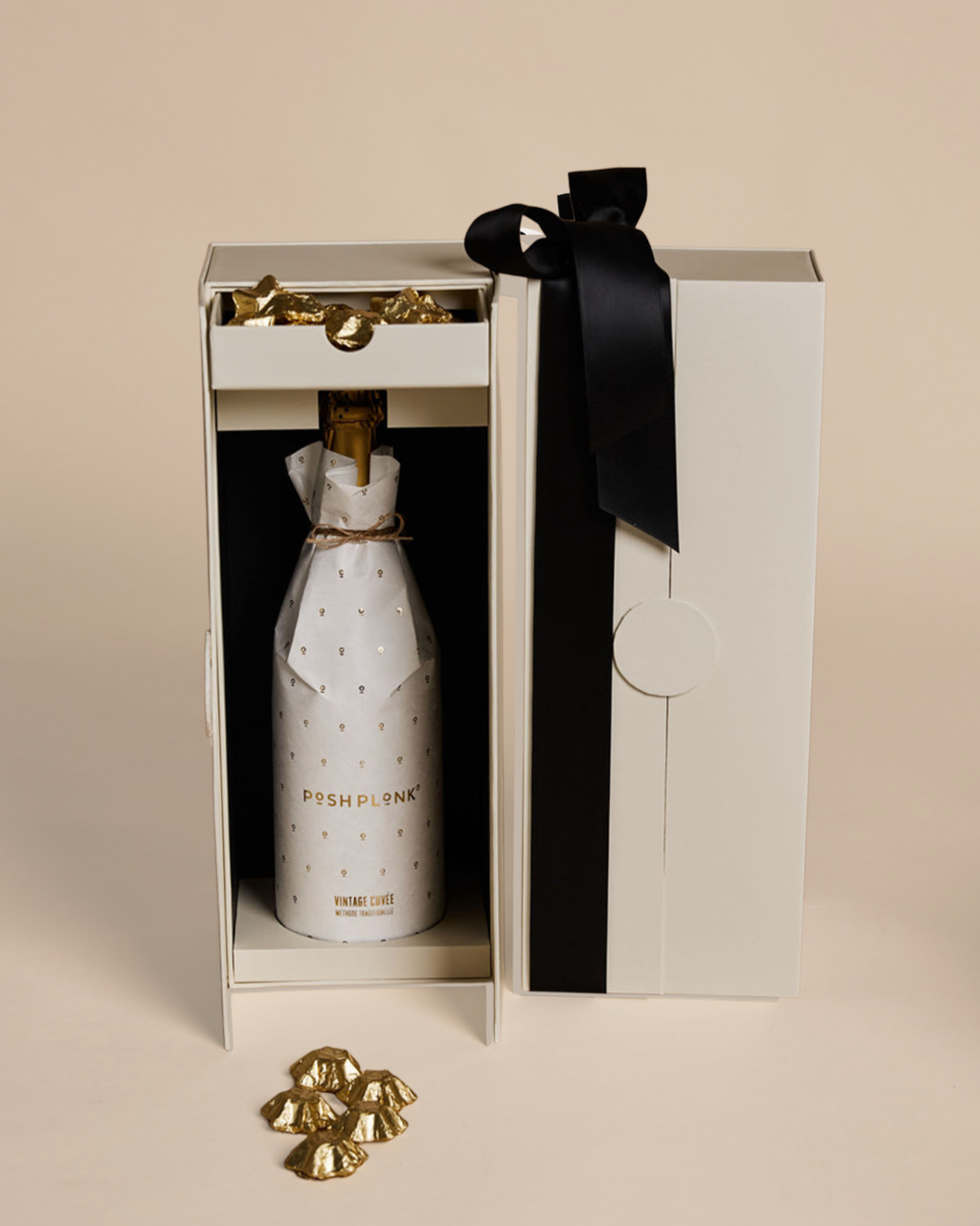 Parcelle | Parcelle Posh Cuvée Christmas Cellar featuring Posh Plonk Vintage Cuvée and Belgian gold star chocolates in a luxury double-door cellar gift box.