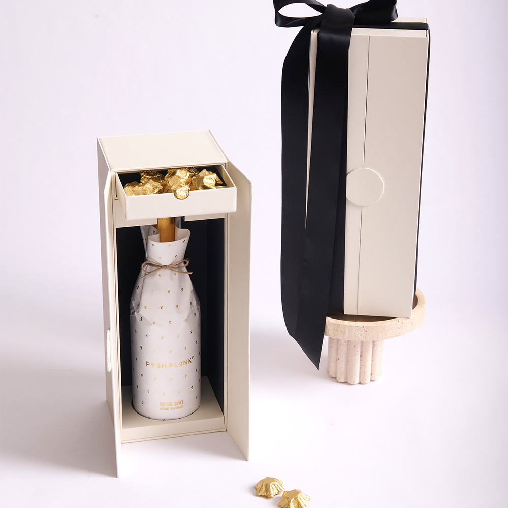 
                      
                        Parcelle | The Parcelle Cuvee Christmas Cellar gift box, featuring a sleek double-door magnetic closure, ideal for luxury corporate and holiday gifting.
                      
                    