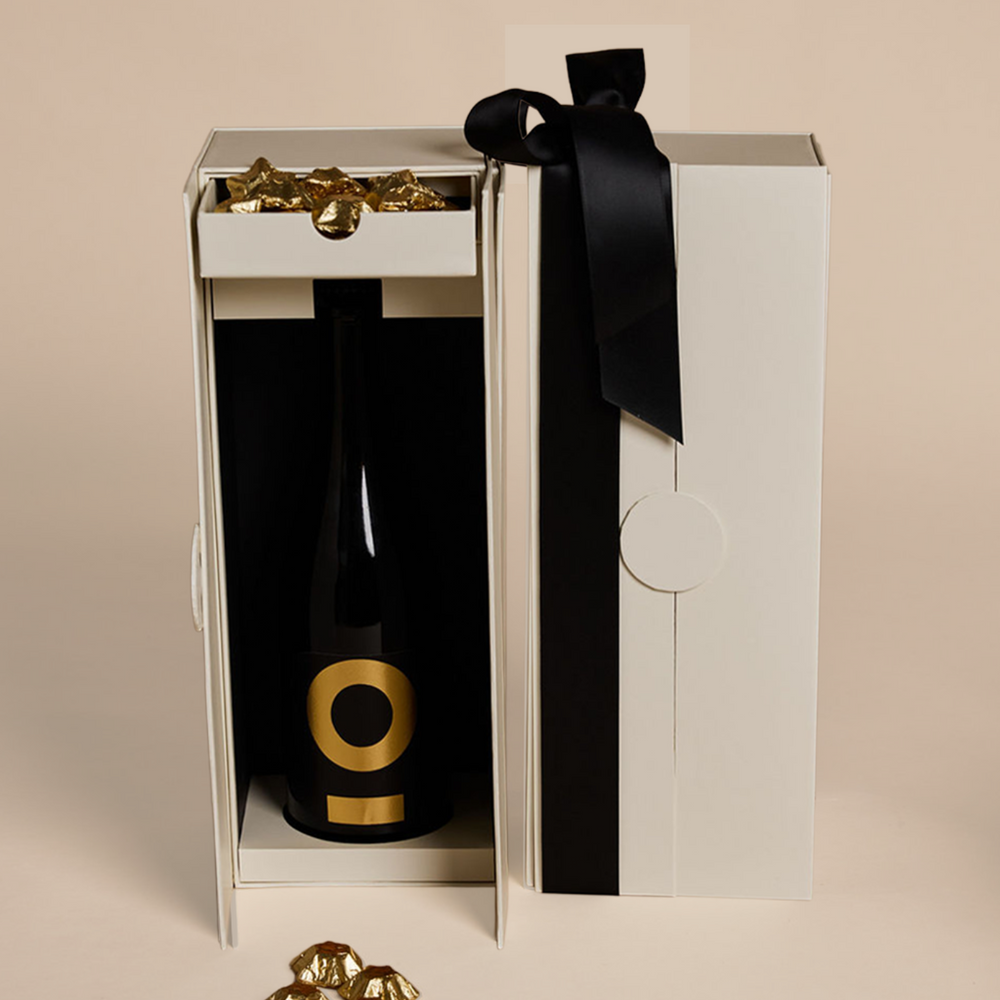Parcelle | Luxury Posh Prosecco Christmas Cellar Gift Box with Posh Plonk Prosecco and Belgian gold star chocolates in Parcelle’s signature double-door cellar box