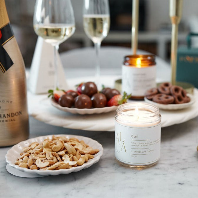 
                      
                        Parcelle | Holiday table setup featuring Parcelle's "Merry Holiday" gift set, highlighting the luxurious wine and chocolate pairings inside.
                      
                    