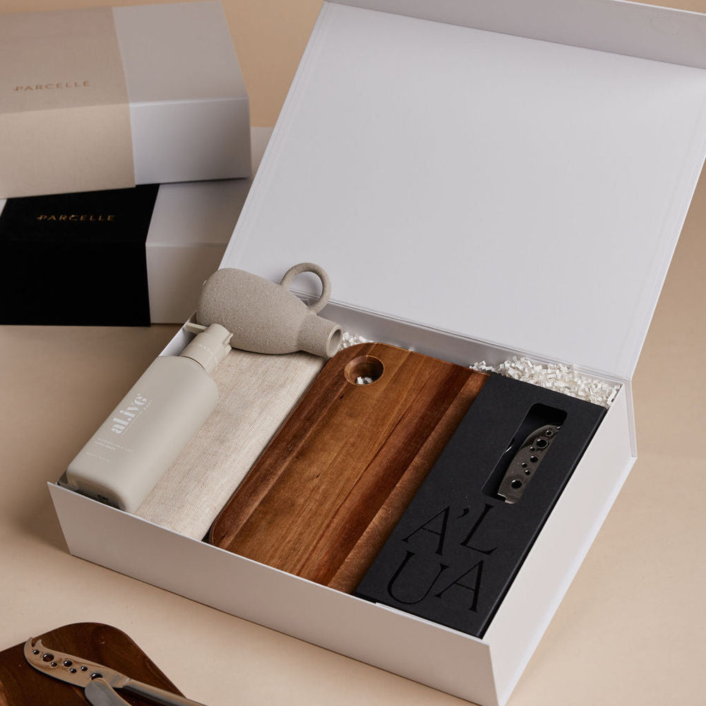 Parcelle | The Villa luxury housewarming gift with hand wash, linen towel, cheese knife set, wooden board, and ceramic vase in Parcelle gift box — perfect settlement gift Sydney