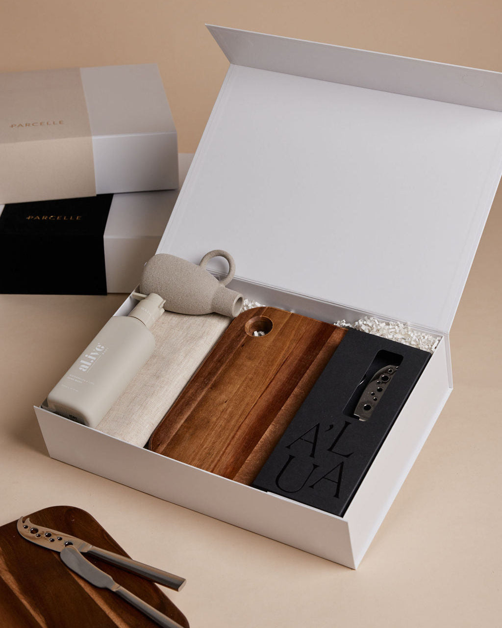 Parcelle | The Villa luxury housewarming gift with hand wash, linen towel, cheese knife set, wooden board, and ceramic vase in Parcelle gift box — perfect settlement gift Sydney