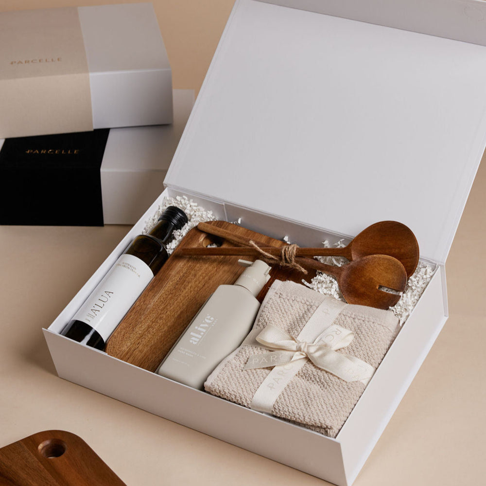 Parcelle | The Cottage housewarming hamper with olive oil, watermelon & lime hand wash, wooden board, salad servers, and Bambury face washers — luxury settlement gift Sydney.