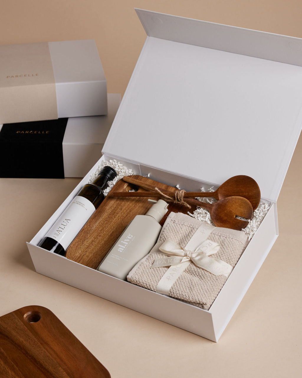 Parcelle | The Cottage housewarming hamper with olive oil, watermelon & lime hand wash, wooden board, salad servers, and Bambury face washers — luxury settlement gift Sydney.