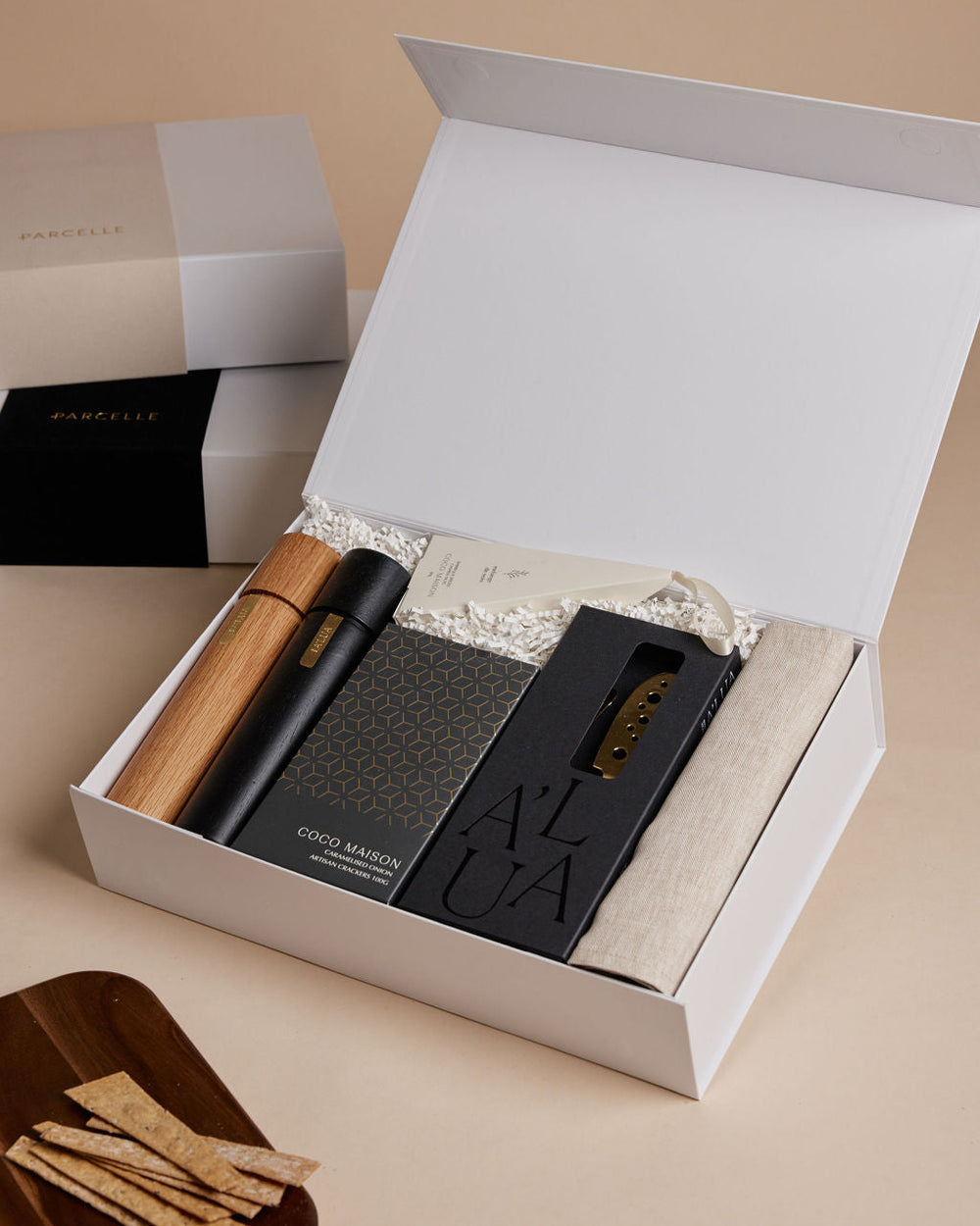 Parcelle | The Loft settlement hamper with Australian olive oil, artisan crackers, BBQ cashews, wooden grinder set, and luxury cheese knife set — corporate housewarming gift Sydney