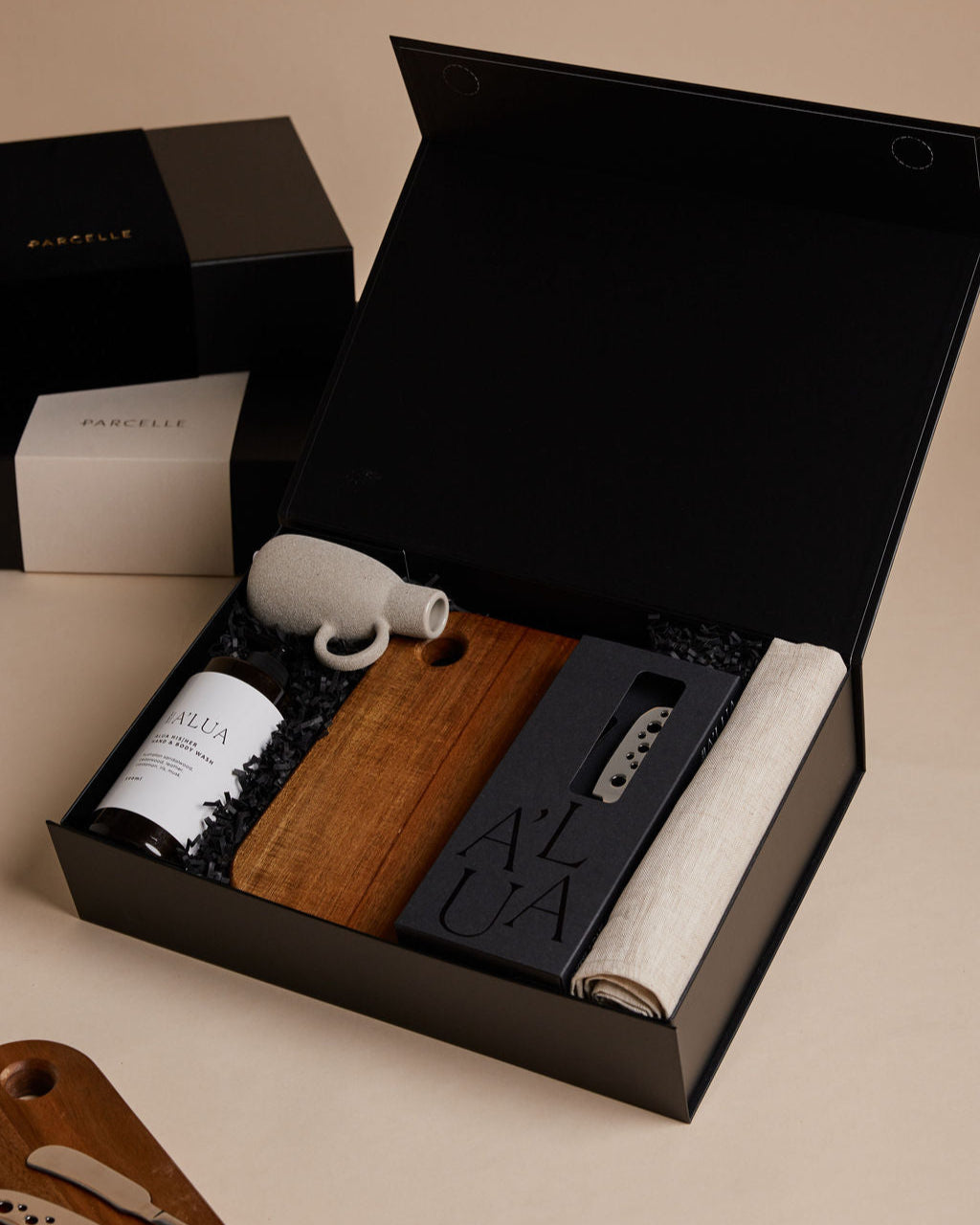 Parcelle | The Quinta luxury new home gift with hand & body wash, linen hand towel, cheese knife set, ceramic vase, and wooden board — property settlement hamper Sydney