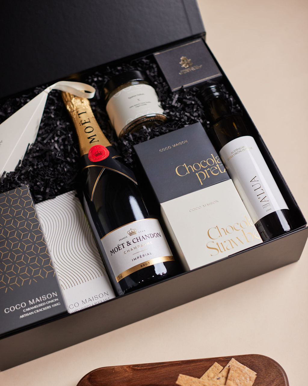 Parcelle | Celebrate in style with Veuve Clicquot and artisan chocolate in our luxury Cellar Box. Branded for premium car handovers and milestone gifting.