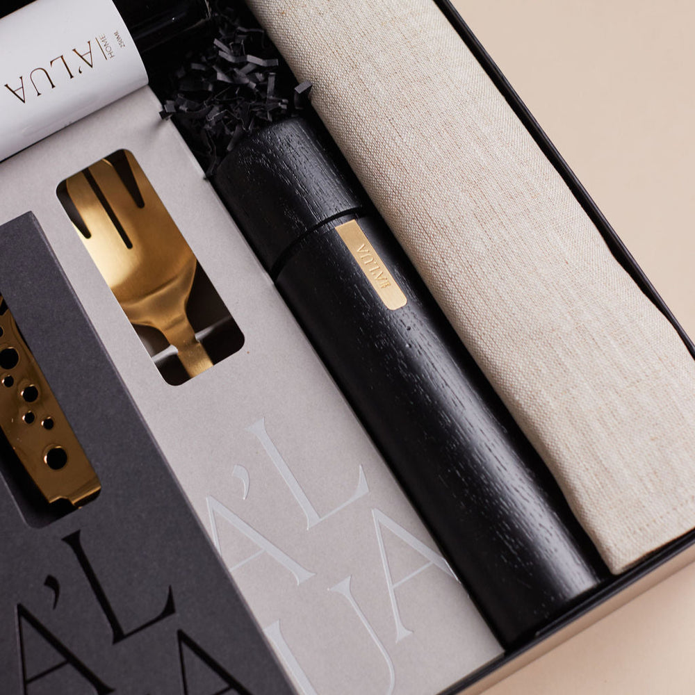 
                      
                        Parcelle | Close-up of The Entertainer hamper with artisan homewares and gourmet essentials
                      
                    