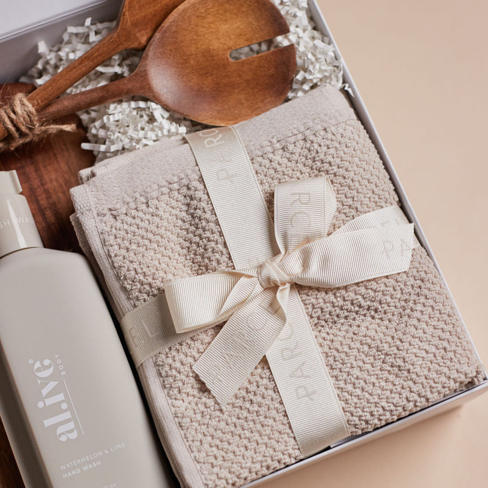 Parcelle | The Cottage housewarming hamper with olive oil, watermelon & lime hand wash, wooden board, salad servers, and Bambury face washers — luxury settlement gift Sydney.