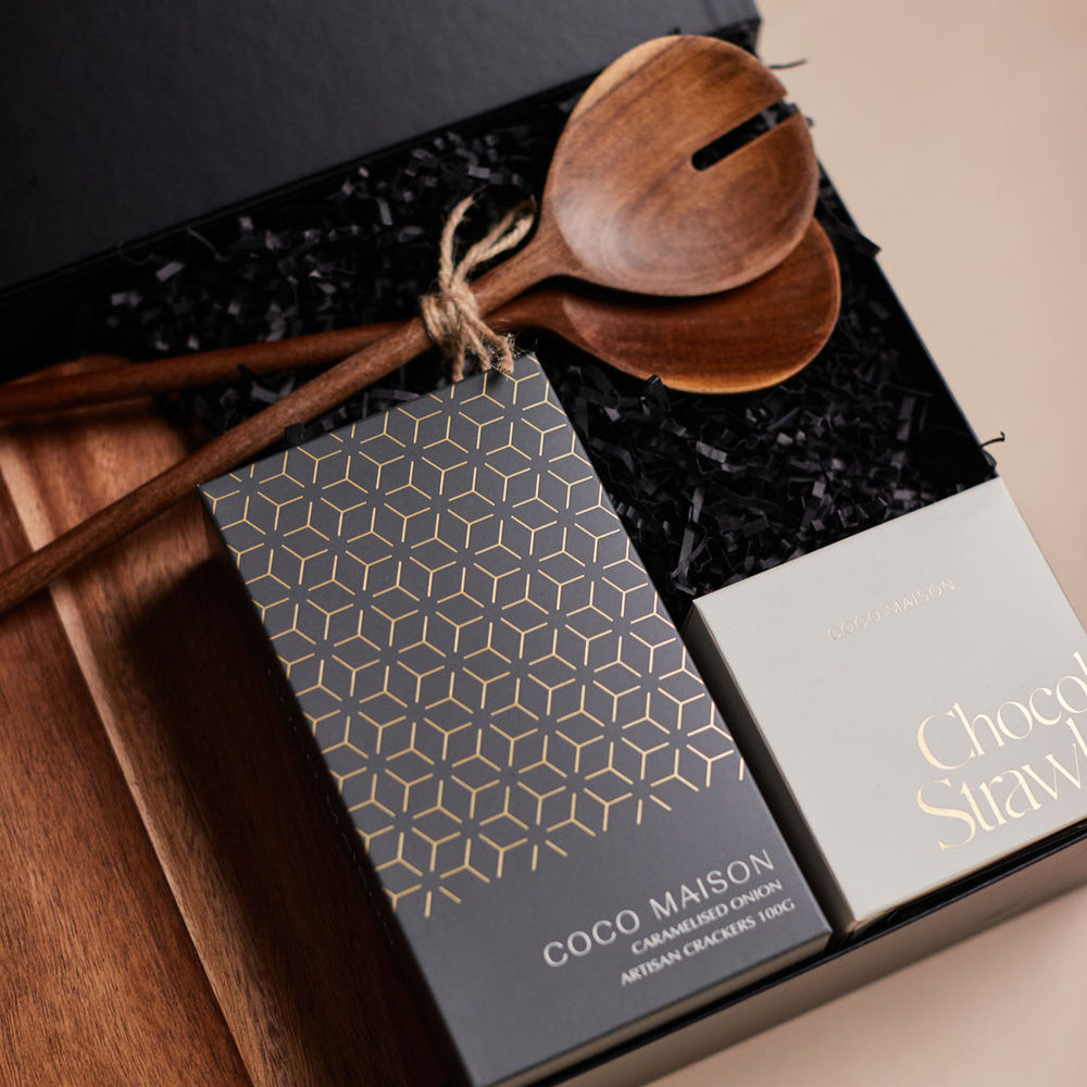 
                      
                        Parcelle | The Farm House housewarming hamper with salad servers, wooden board, artisan crackers, and chocolate-dipped strawberries in Parcelle signature gift box
                      
                    