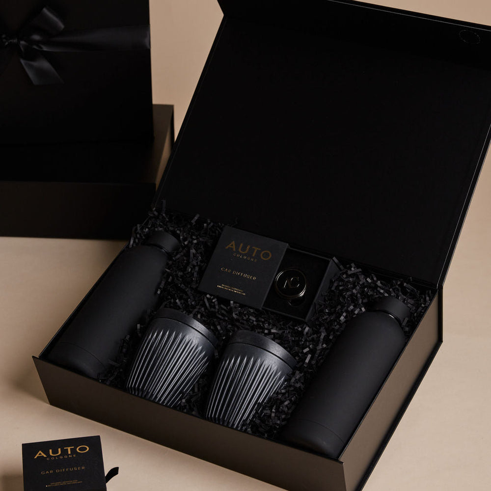 
                      
                        Parcelle | Windows Down gift set featuring branded water bottles, reusable coffee cups, and car fragrance in Parcelle packaging
                      
                    