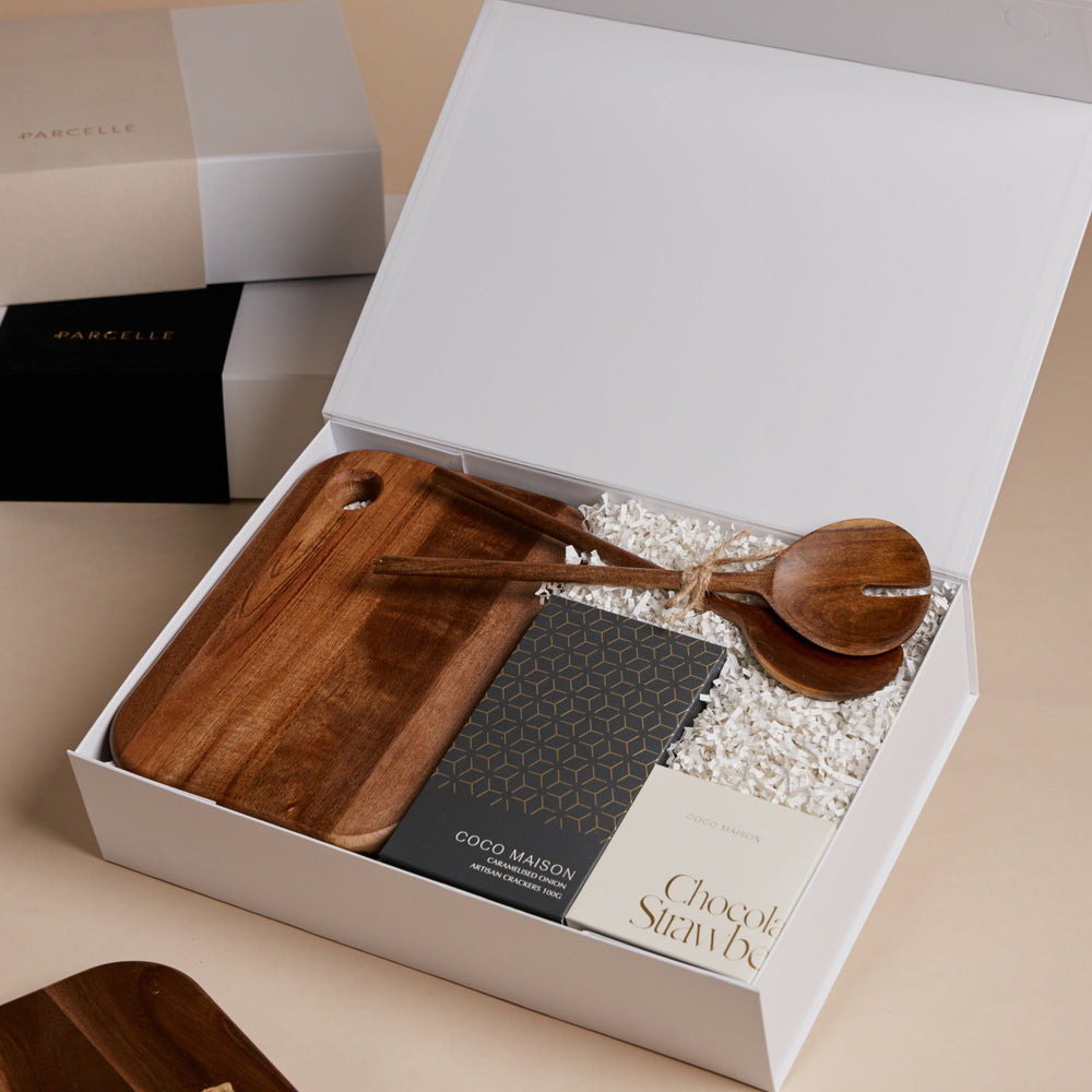 Parcelle | The Habitat settlement gift box with wooden board, artisan crackers, salad servers, and chocolate-dipped strawberries — luxury housewarming hamper Sydney
