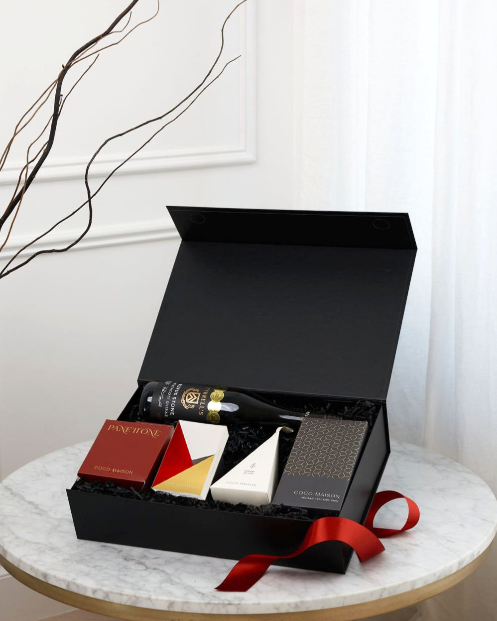 Parcelle | A Season’s Greetings luxury Christmas hamper with Rufus Stone Shiraz, Panettone, Crackers, Cashews, and Biscoff Chocolate, presented in Parcelle Signature Gift Box with Australiana or Candy Stripe sleeve, free branding available.