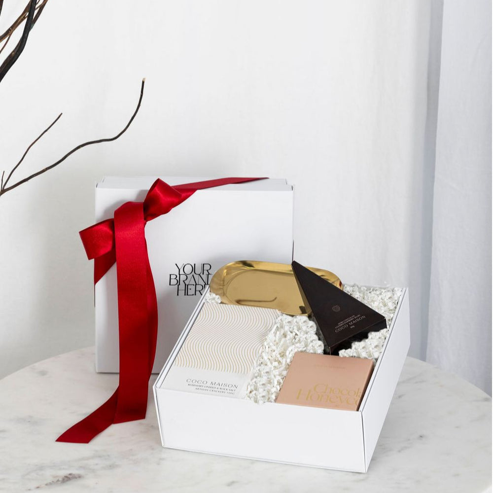 Parcelle | Christmas Cheer luxury hamper with Rosemary & Sea Salt Crackers, Milk Chocolate Honeycomb, Dark Chocolate Raspberries, and Gold Dish, presented in Parcelle gift box with Australiana or Candy Stripe sleeve, free branding available