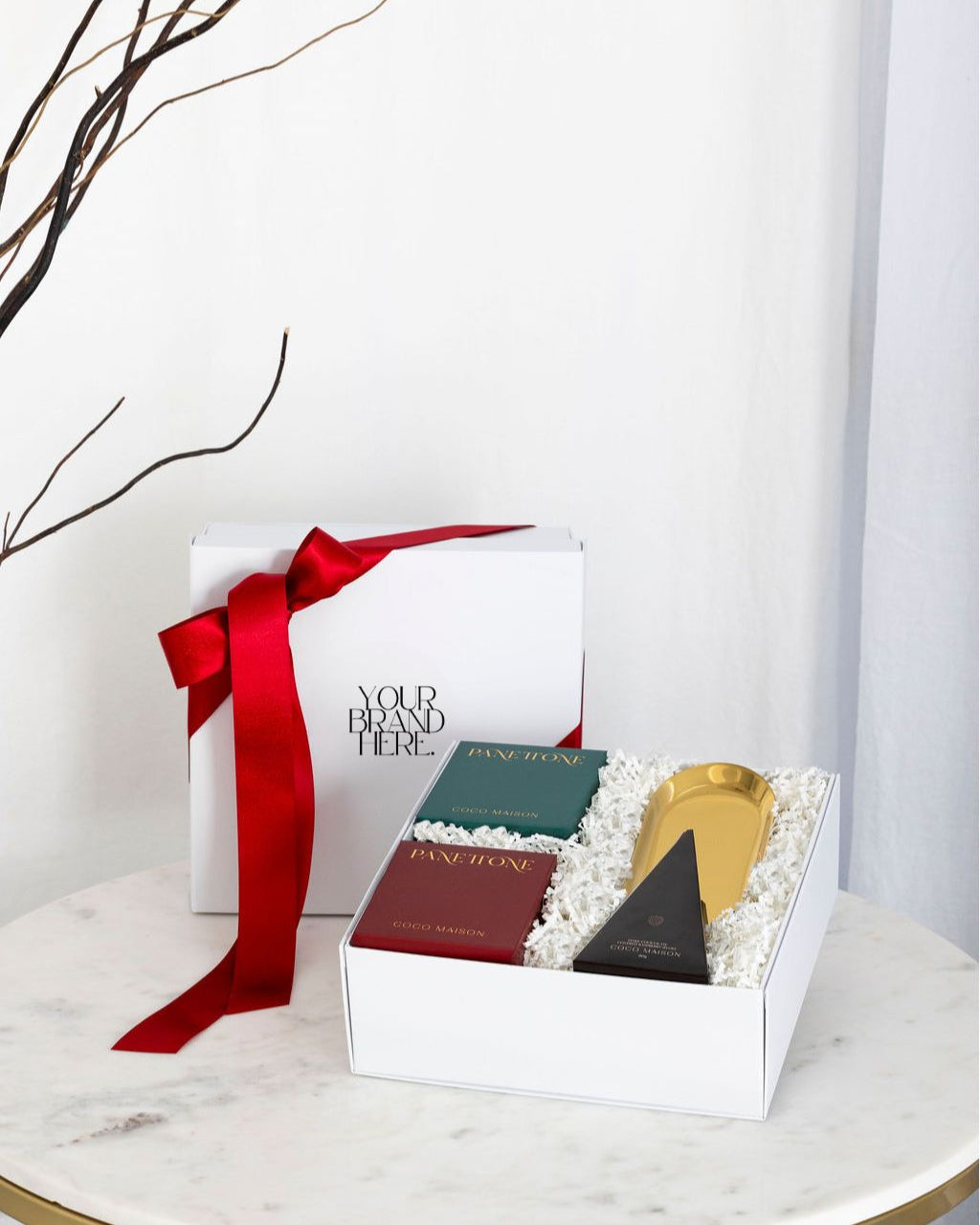 Parcelle_Classic Christmas corporate hamper with Panettone, Raspberry Jellies, and Gold Tray, presented in Parcelle gift box with Australiana or Candy Stripe sleeve, free branding available