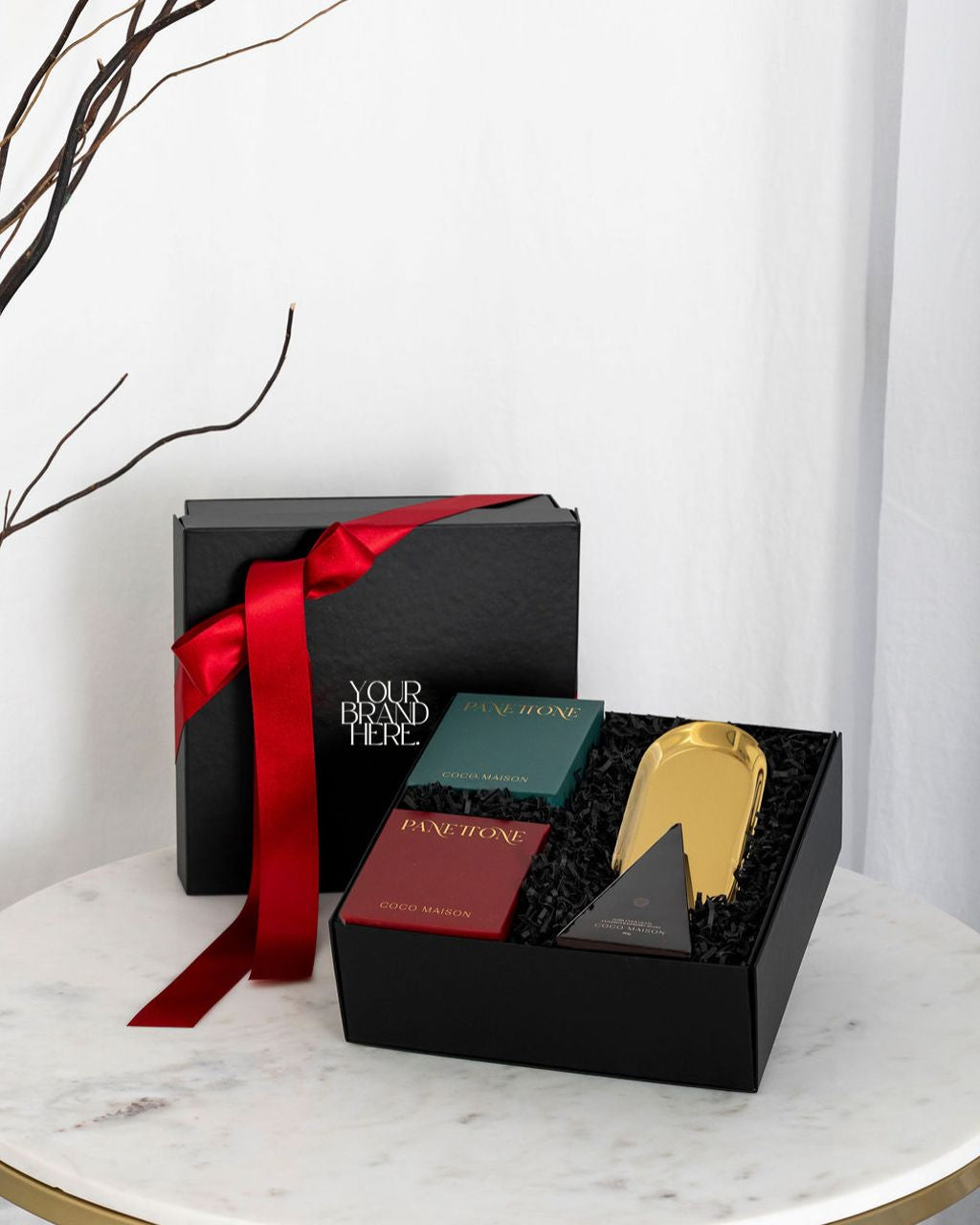 Parcelle | Dolce Christmas luxury hamper with Traditional and Choc Chip Panettone, Milk Chocolate Macadamias, and a Gold Tray, presented in Parcelle gift box with festive sleeve, free branding available.