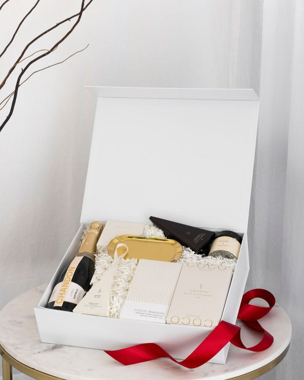 Parcelle | White Christmas luxury hamper with Chandon Sparkling, Grissini, Crackers, Cashews, Chocolates, Salt Flakes, and Gold Tray, presented in Parcelle Signature Large Gift Box with Australiana or Candy Stripe sleeve, free branding available