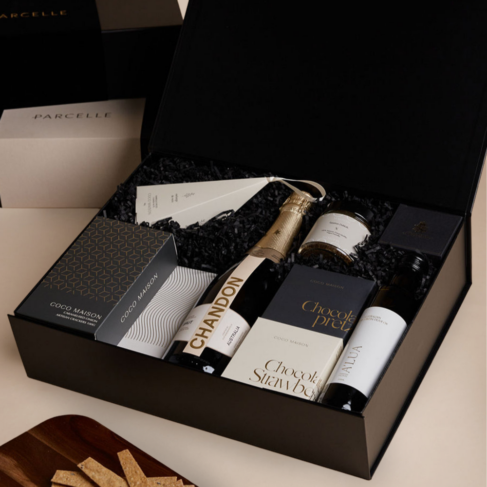 Parcelle | Corporate Chandon Christmas Hamper with sparkling wine, olive oil, savoury crackers, tapenade, chocolates and cashews in Parcelle XL Gift Box with custom branding and ribbon