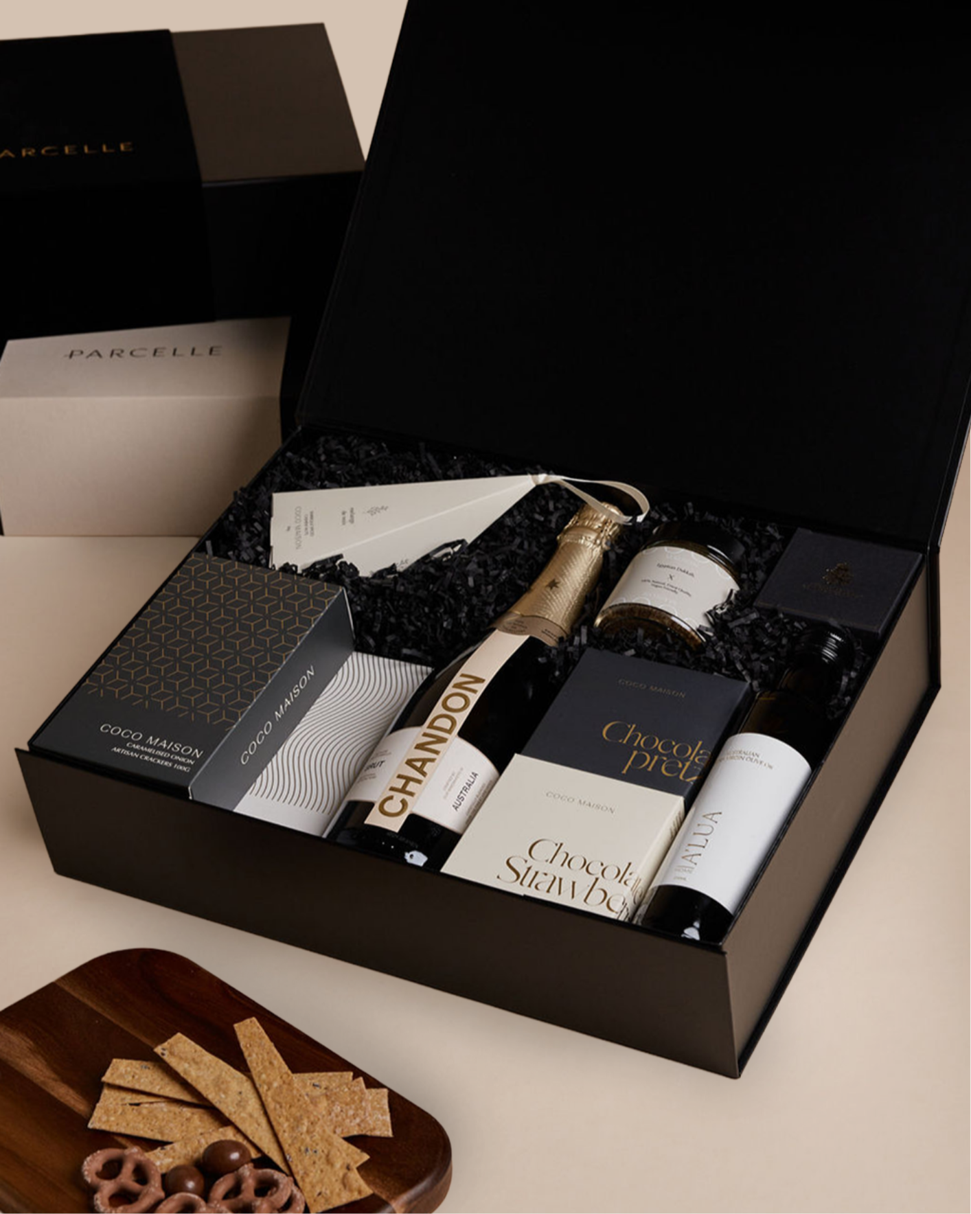 Parcelle | Corporate Chandon Christmas Hamper with sparkling wine, olive oil, savoury crackers, tapenade, chocolates and cashews in Parcelle XL Gift Box with custom branding and ribbon