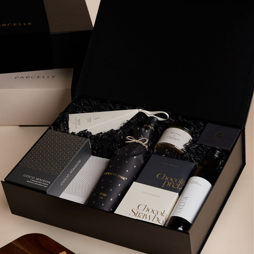 Parcelle | Corporate Shiraz Christmas Hamper with Posh Plonk Shiraz, olive oil, savoury crackers, tapenade, chocolates and cashews in Parcelle XL Gift Box with custom logo branding and ribbon
