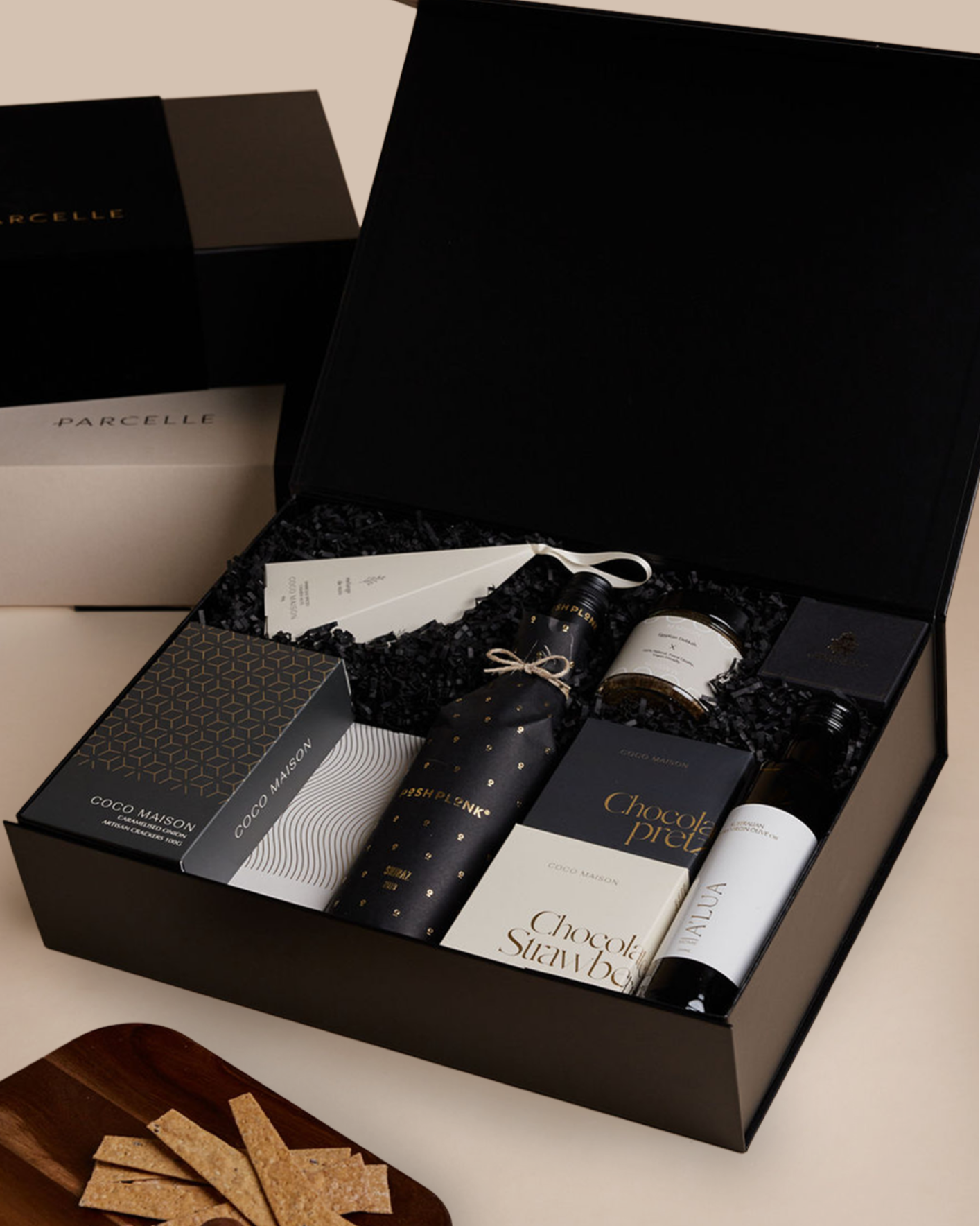 Parcelle | Corporate Shiraz Christmas Hamper with Posh Plonk Shiraz, olive oil, savoury crackers, tapenade, chocolates and cashews in Parcelle XL Gift Box with custom logo branding and ribbon