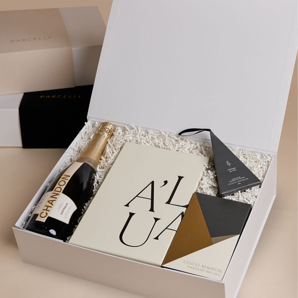 Parcelle | Corporate Chandon Christmas Hamper with champagne, glassware, chocolates and macadamias in Parcelle XL Gift Box with custom logo branding and ribbon.