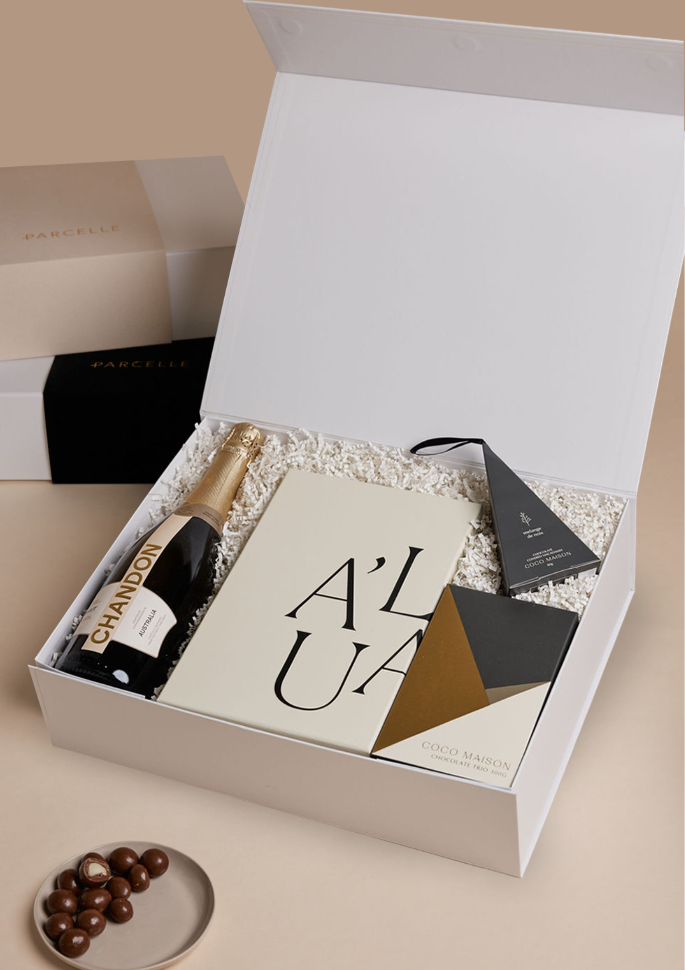 Parcelle | Corporate Chandon Christmas Hamper with champagne, glassware, chocolates and macadamias in Parcelle XL Gift Box with custom logo branding and ribbon.